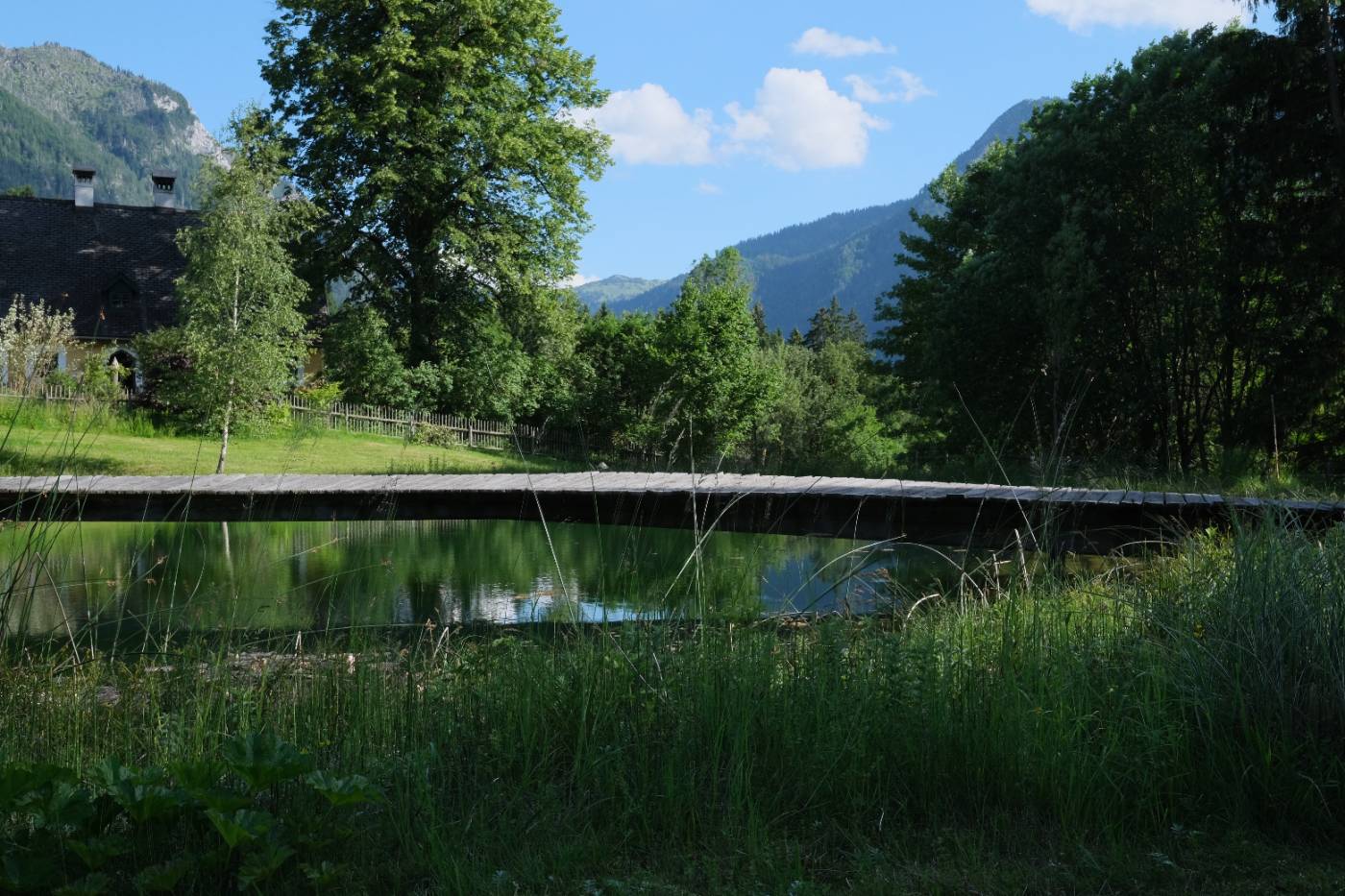 Wooden bridge over the pond near Lunz am See in autumn