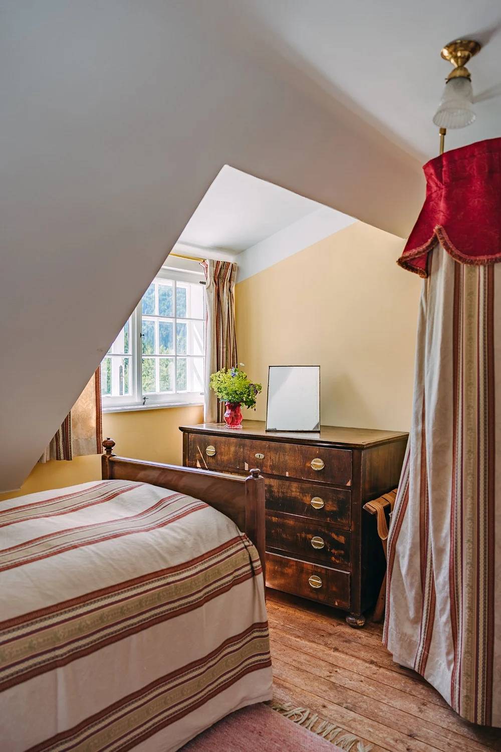 Single Room With Bath with ochre walls and antique furnishings